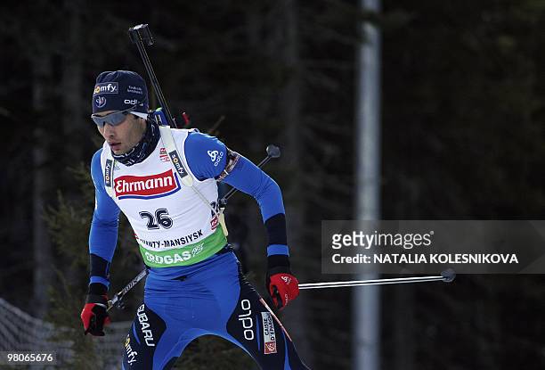 Martin Fourcade of France competes during the men's 10 km sprint event of the Biathlon World Cup in the Siberian city of Khanty-Mansiysk on March 26,...
