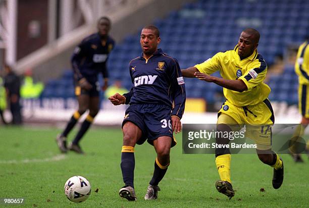 David Nielson of Wimbledon and Michael Johnson of Birmingham in action during the Wimbledon v Birmingham City Nationwide First Division match played...