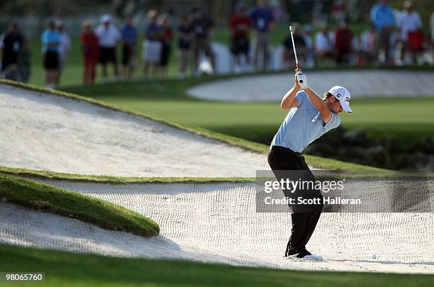 Nick Watney plays a bunker shot on the 13th hole during the second round of the Arnold Palmer Invitational presented by MasterCard at the Bayhill...