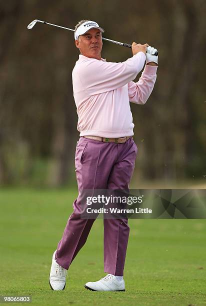 Darren Clarke of Northern Ireland plays his second shot into the seventh green during the second round of the Open de Andalucia 2010 at Parador de...