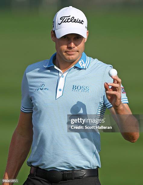 Nick Watney waves to the gallery on the 13th hole during the second round of the Arnold Palmer Invitational presented by MasterCard at the Bayhill...