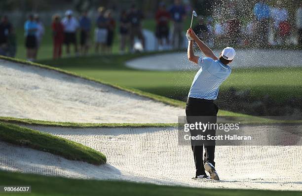 Nick Watney plays a bunker shot on the 13th hole during the second round of the Arnold Palmer Invitational presented by MasterCard at the Bayhill...