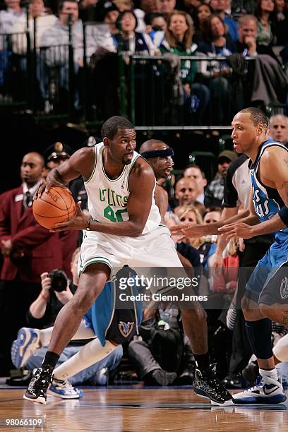 Michael Finley of the Boston Celtics handles the ball against Shawn Marion of the Dallas Mavericks during the game on March 20, 2010 at American...