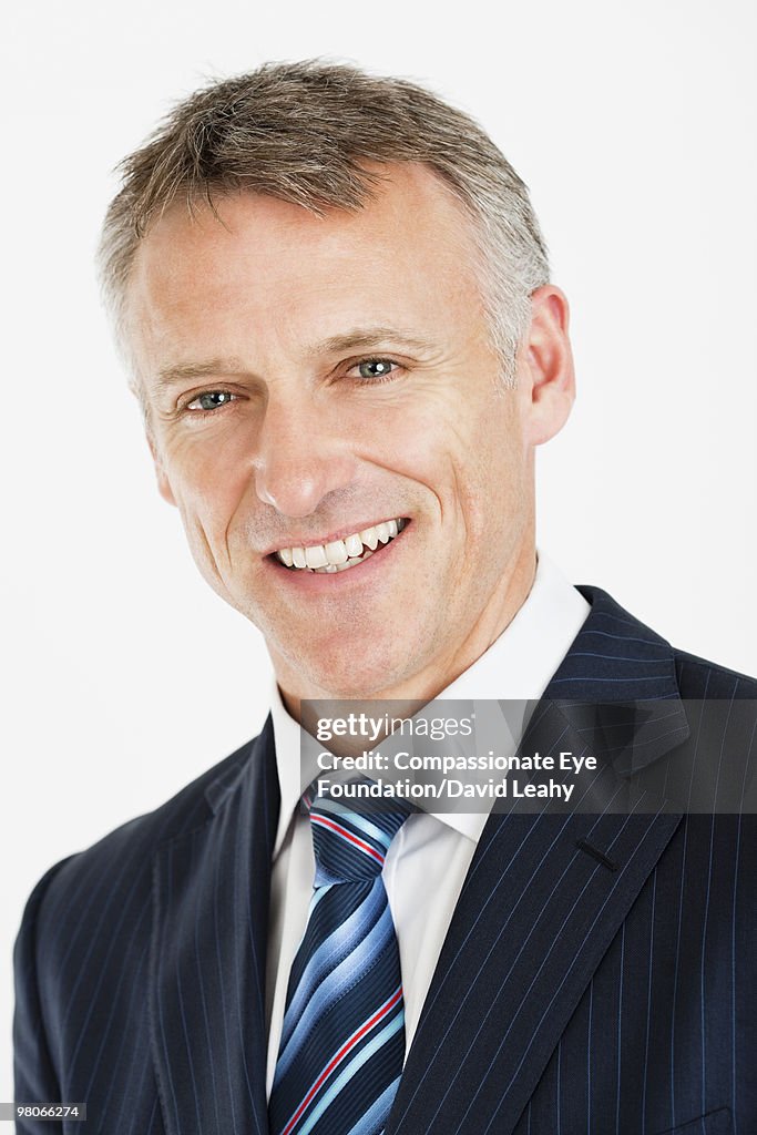 Portrait of smiling man wearing a suit