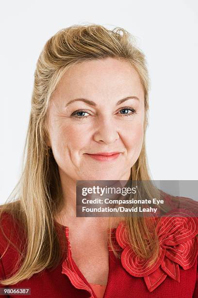 portrait of smiling blonde woman - david leahy studio stock pictures, royalty-free photos & images