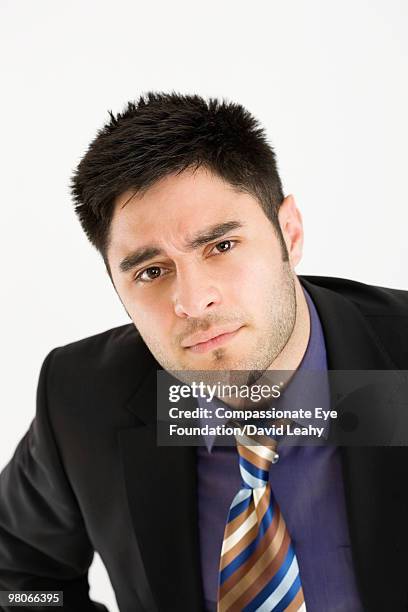 portrait of man in suit - david leahy studio stock pictures, royalty-free photos & images