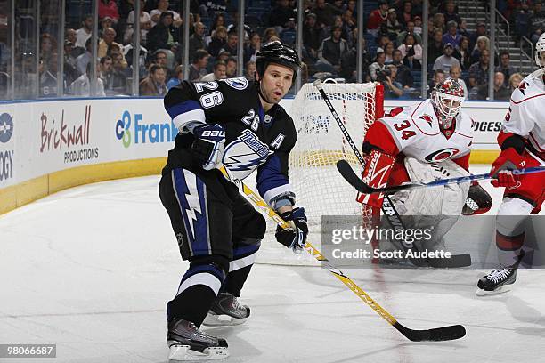 Martin St. Louis of the Tampa Bay Lightning waits for the puck while playing against the Carolina Hurricanes at the St. Pete Times Forum on March 23,...