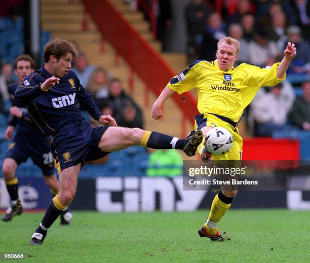 Kenny Cunningham of Wimbledon and Andrew Johnson of Birmingham in action during the Wimbledon v Birmingham City Nationwide First Division match...