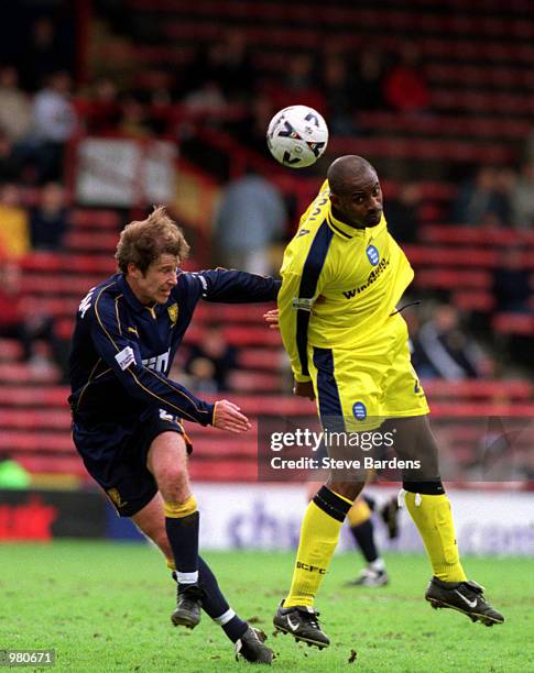 Kenny Cunningham of Wimbledon and Dele Adebola of Birmingham in action during the Wimbledon v Birmingham City Nationwide First Division match played...