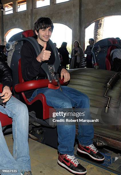 Basketball player Ricky Rubio rides the 'Furius Baco' rollercoaster during the inaugration of the 2010 season at PortAventura theme park on March 26,...