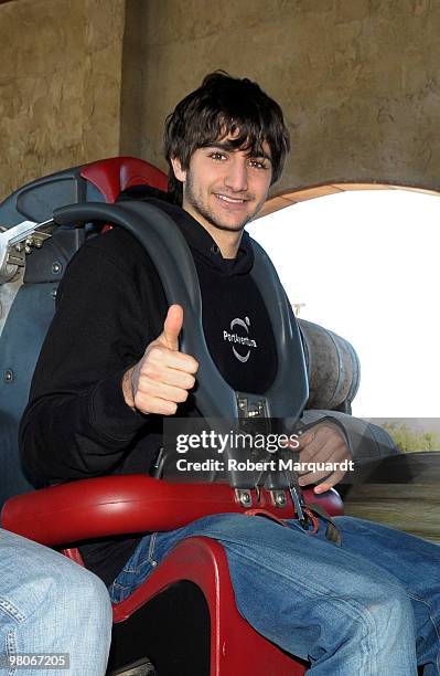 Basketball player Ricky Rubio rides the 'Furius Baco' rollercoaster during the inaugration of the 2010 season at PortAventura theme park on March 26,...