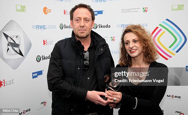 Rene Dame and Carmen Butta pose at the Adolf Grimme Awards on March 26, 2010 in Marl, Germany. Rene Dame and Carmen Butta received the award for the...