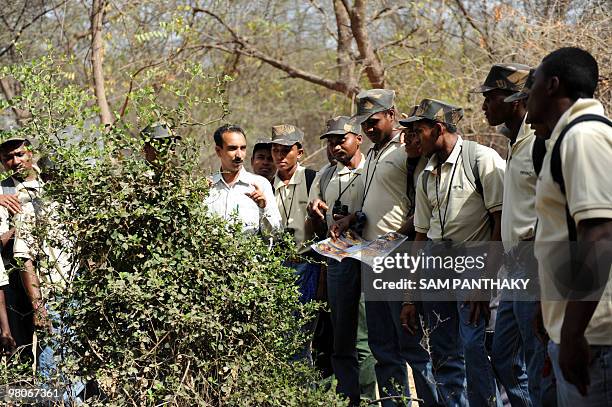 Indian youths from the Siddi community from the Sasan Gir region of Gujarat state participate in a field session as part of an Eco Guide training...