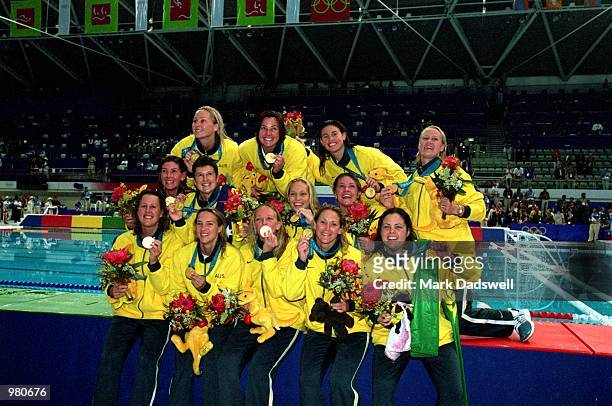 The Women's Australian Water Polo team celebrate their gold medal victory after defeating the USA in the Women's Water Polo final held at the Sydney...
