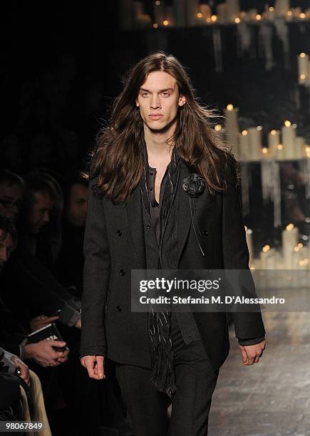 Model walks the runway during the John Varvatos Milan Menswear Autumn/Winter 2010 show on January 17, 2010 in Milan, Italy.