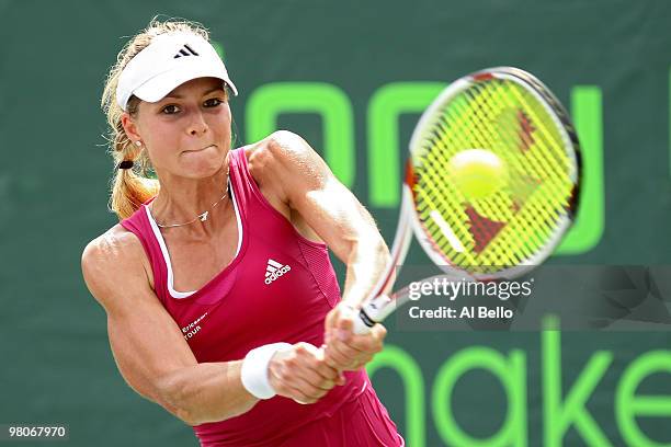 Maria Kirilenko of Russia returns a shot against Melinda Czink of Hungary during day four of the 2010 Sony Ericsson Open at Crandon Park Tennis...