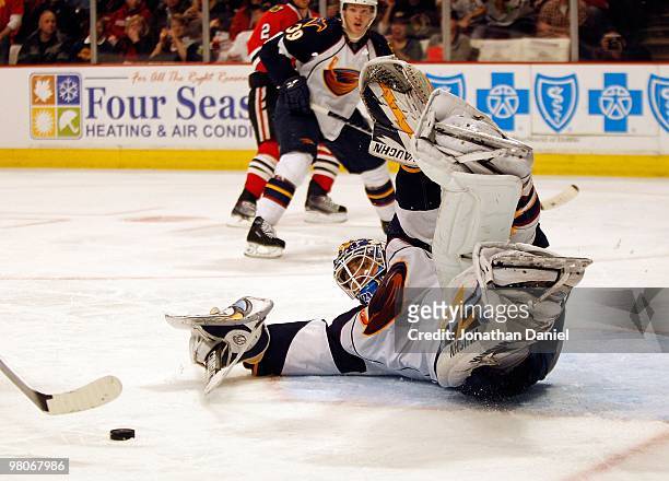 Ondrej Pavelec of the Atlanta Thrashers falls in front of the goal against the Chicago Blackhawks at the United Center on February 13, 2010 in...