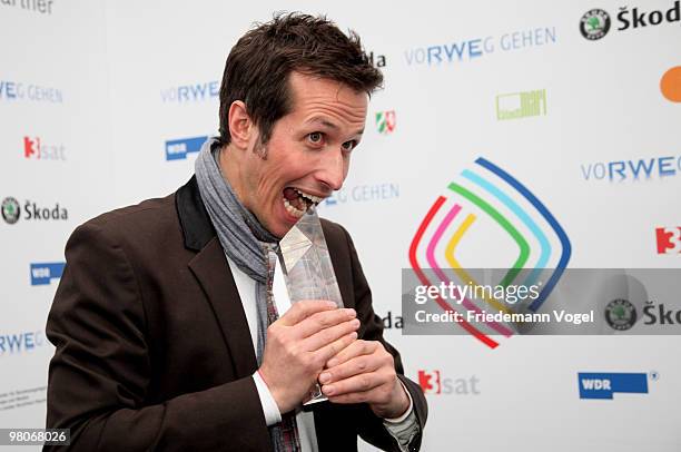 Host Helmar Weitzel poses at the Adolf Grimme Awards on March 26, 2010 in Marl, Germany. Helmar Weitzel received the award for his children's...