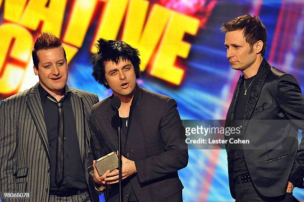 Tre Cool, Billie Joe Armstrong and Mike Dirnt of Green Day onstage at the 2009 American Music Awards at Nokia Theatre L.A. Live on November 22, 2009...