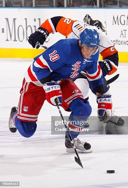 Marian Gaborik of the New York Rangers skates with the puck in the second period against the New York Islanders on March 24, 2010 at Madison Square...