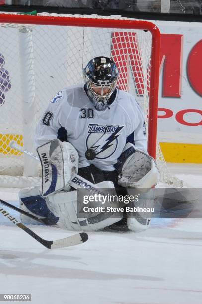 Antero Niittymaki of the Tampa Bay Lightning catches the puck against the Boston Bruins at the TD Garden on March 25, 2010 in Boston, Massachusetts.