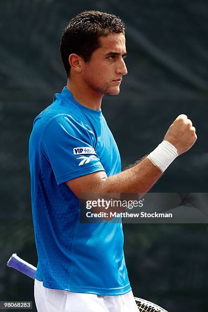 Nicolas Almagro of Spain celebrates a point against Eduardo Schwank of Argentina during day four of the 2010 Sony Ericsson Open at Crandon Park...