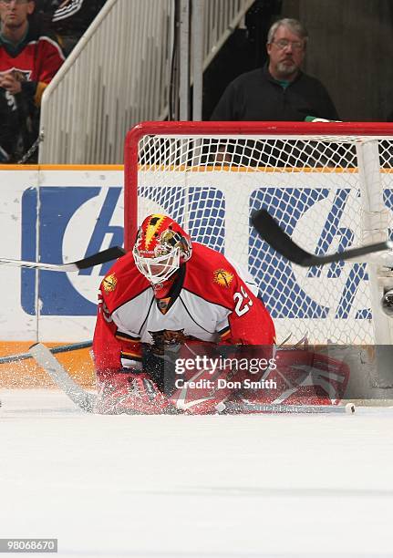 Tomas Vokoun of the Florida Panters falls on the puck to cover it during an NHL game against the San Jose Sharks on March 13, 2010 at HP Pavilion at...