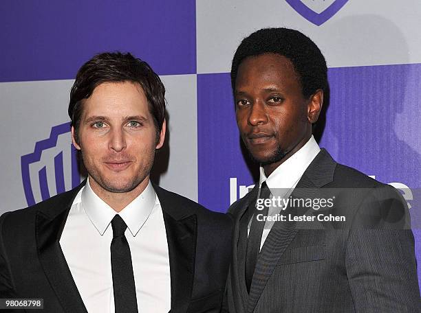 Actors Peter Facinelli and Edi Gathegi attend the InStyle and Warner Bros. 67th Annual Golden Globes post party held at the Oasis Courtyard at The...