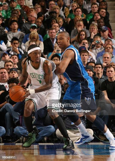 Marquis Daniels of the Boston Celtics handles the ball against Caron Butler of the Dallas Mavericks during the game on March 20, 2010 at American...