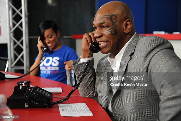 Mike Tyson answers phones for the BET-SOS Saving Ourselves � Help for Haiti Benefit telethon at AmericanAirlines Arena on February 5, 2010 in Miami,...