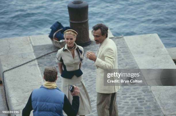 American Hollywood actress Cheryl Ladd, playing Grace Kelly, and actor Alejandro Rey , playing Oleg Cassini, as they discuss a scene from television...