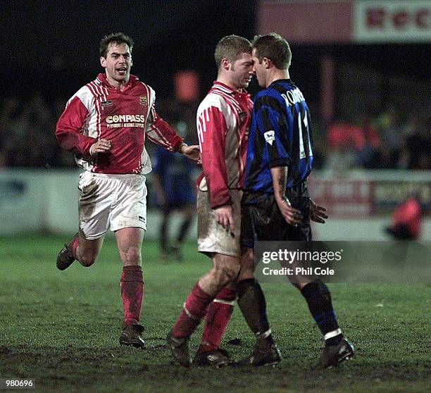 Mark Janney of Dagenham & Redbridge and John Robinson of Charlton Athletic during the AXA FA Cup third Round Replay game between Dagenham & Redbridge...