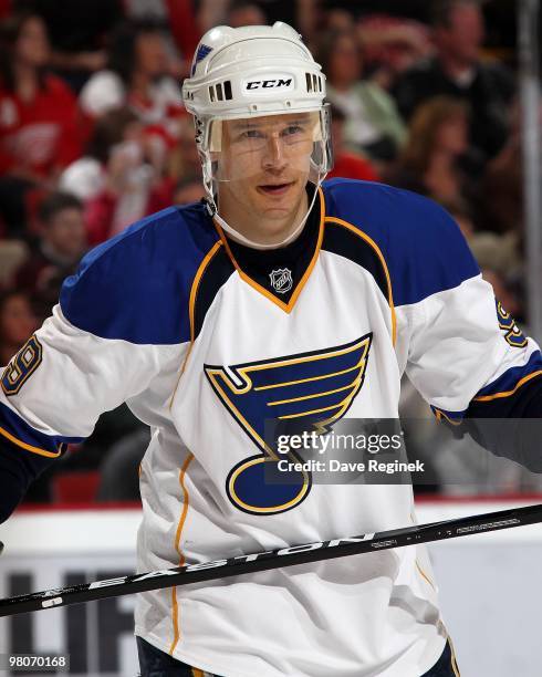 Paul Kariya of the St. Louis Blues moves on the face-off during an NHL game against the Detroit Red Wings at Joe Louis Arena on March 24, 2010 in...