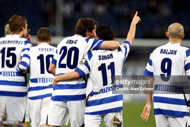 Olcay Sahan of Duisburg celebrates his team's second goal with team mates during the Second Bundesliga match between MSV Duisburg and TuS Koblenz at...