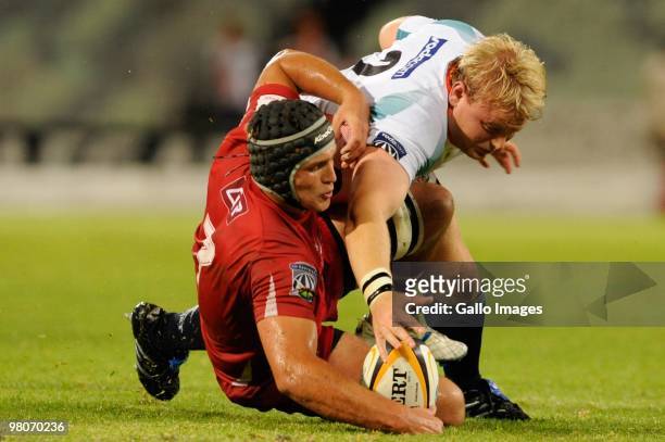 Adriaan Strauss for the Cheetahs and Jake Schatz for the Reds during the Super 14 match between Vodacom Cheetahs and Reds from Vodacom Park on March...