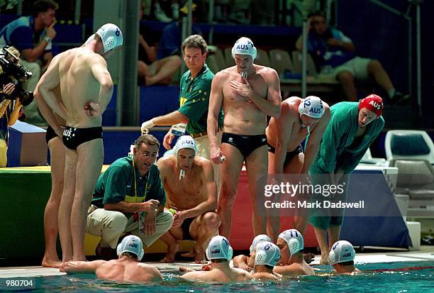 The Men's Australian Water Polo team huddle during the Men's Water Polo Quarter Final match played between Australia and Yugoslavia held at the Ryde...