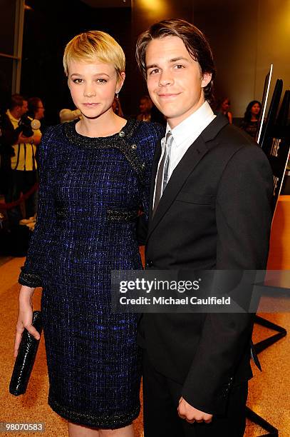 Actress Carey Mulligan and actor Johnny Simmons arrive at "The Greatest" Los Angeles Premiere at Linwood Dunn Theater on March 25, 2010 in Hollywood,...