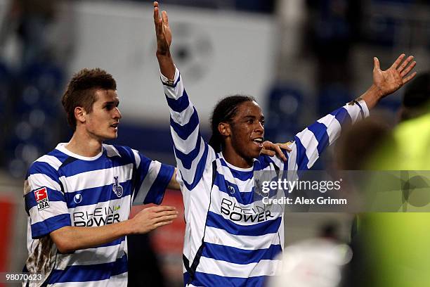 Caiuby of Duisburg celebrates his team's fourth goal with team mate Dario Vidosic during the Second Bundesliga match between MSV Duisburg and TuS...