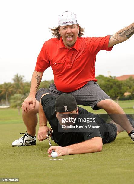 Musician Scott Phillips of Creed and Singer Joey Fatone attend the Super Skins Celebrity Golf Classic Tee Off at The Biltmore Hotel & Golf Club on...