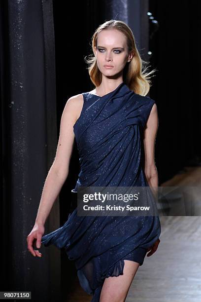 Model walks the runway during the Luis Buchinho Ready to Wear show as part of the Paris Womenswear Fashion Week Fall/Winter 2011 at Lycee Turgot on...