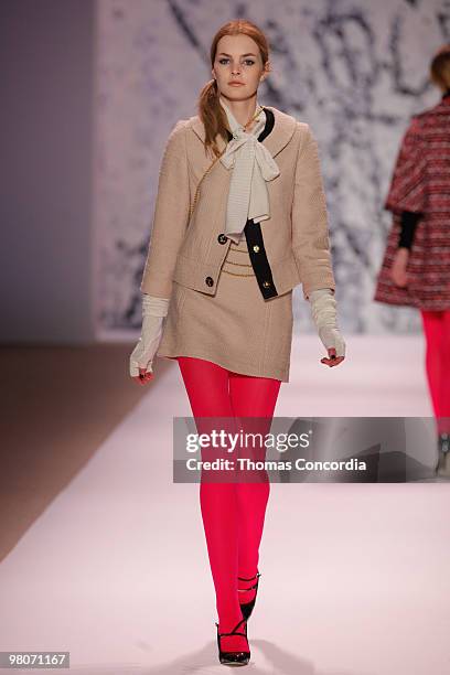 Model walks the runway wearing Milly by Michelle Smith fall 2010 collection during Mercedes-Benz Fashion Week in New York on February 17, 2010