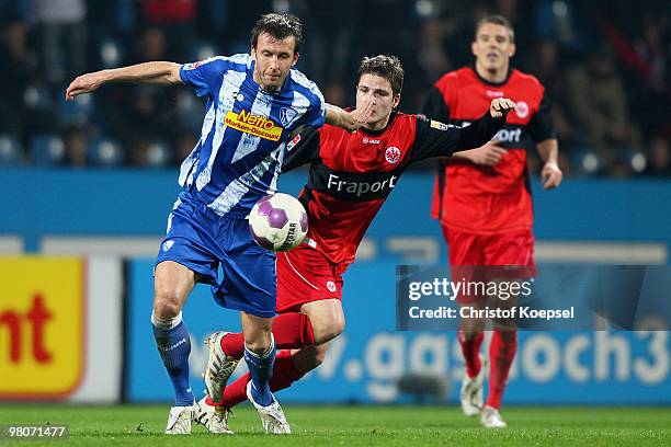 Pirmin Schwegler of Frankfurt challenges Christoph Dabrowski of Bochum during the Bundesliga match between VfL Bochum and Eintracht Frankfurt at...