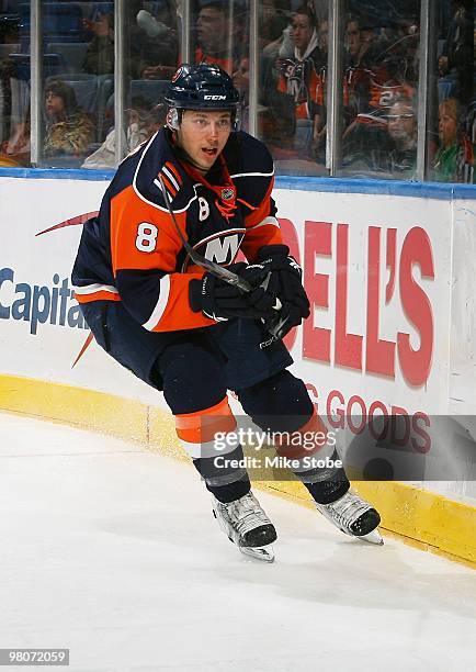 Bruno Gervais of the New York Islanders skates against the Calgary Flames on March 25, 2010 at Nassau Coliseum in Uniondale, New York. Islanders...