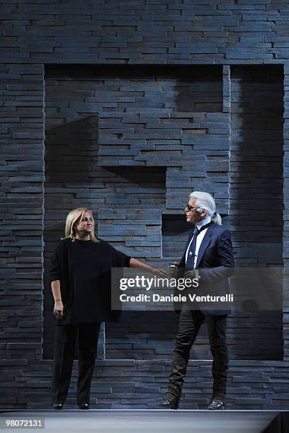 Silvia Venturini Fendi and Karl Lagerfeld aknowledge the applause of the public after the Fendi Milan Fashion Week womenswear Autumn/Winter 2010 show...