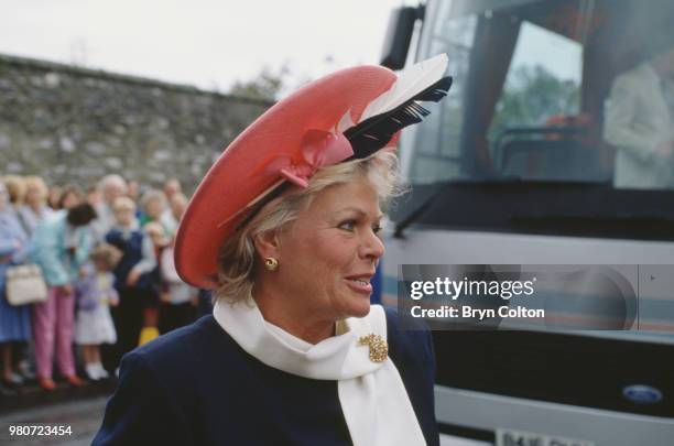 Guests attending the wedding of English tabloid journalist and broadcaster Derek Jameson and Ellen Petrie, Essex, UK, 9th March 1988.