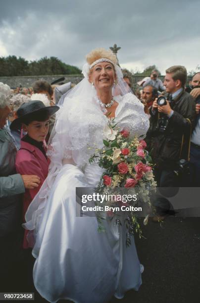 Ellen Petrie and guests on her wedding day, Essex, UK, 9th March 1988.