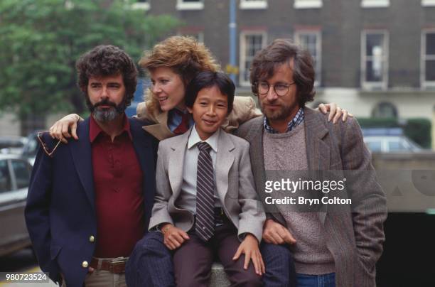 Film director Steven Spielberg, right, poses for a photograph with, left to right, executive producer George Lucas, actress Kate Capshaw, and actor...