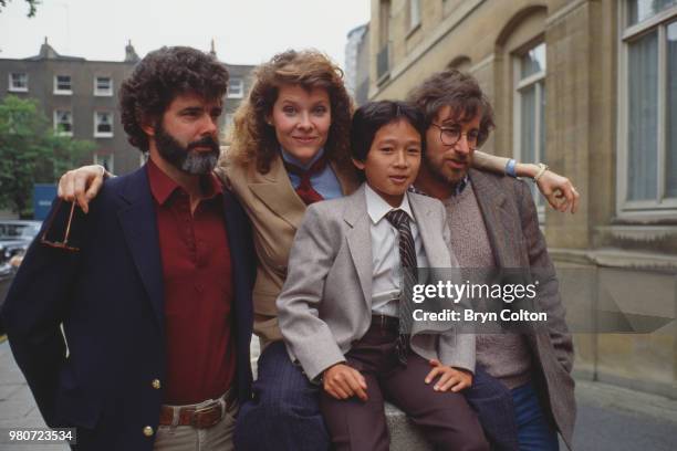 Film director Steven Spielberg, right, poses for a photograph with, left to right, executive producer George Lucas, actress Kate Capshaw, and actor...