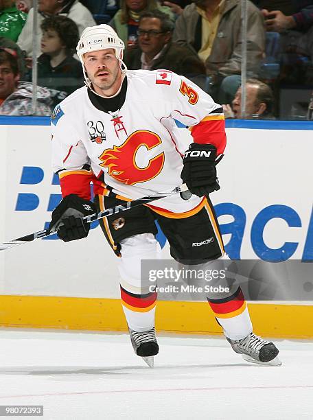 Ian White of the Calgary Flames skates against the New York Islanders on March 25, 2010 at Nassau Coliseum in Uniondale, New York. Islanders defeated...