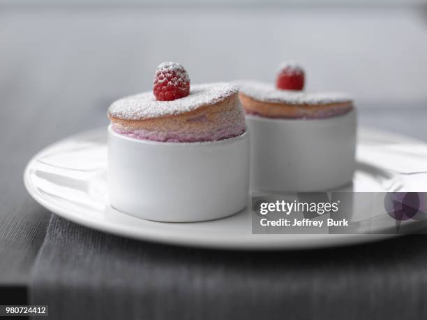 close up of raspberry souffle in mugs - souffle stock pictures, royalty-free photos & images